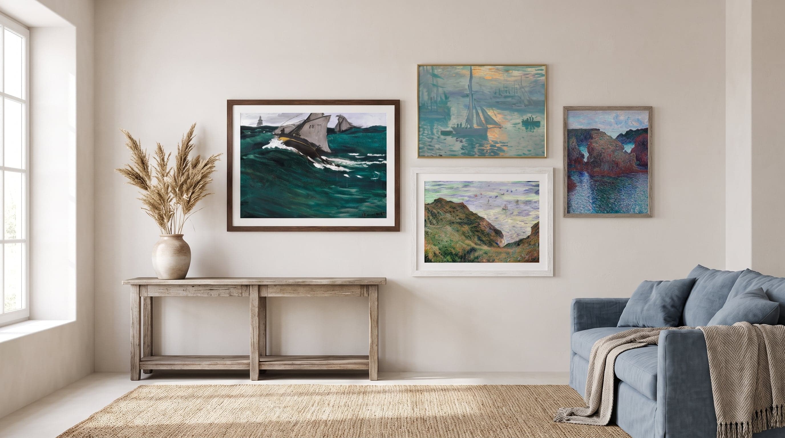 Living room gallery wall featuring four sea-themed art prints in varied frame sizes, coastal style.